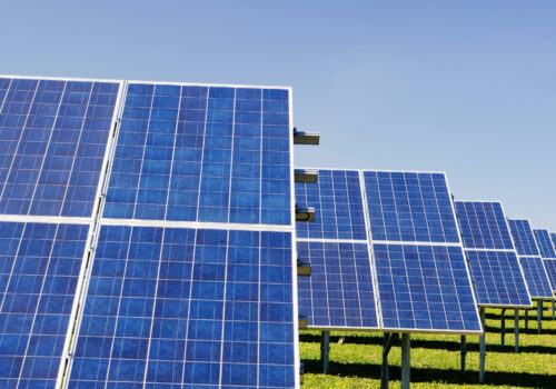 Solar panels on a field of grass